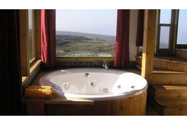 רום 1125 - בקתות עץ