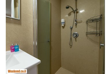 סוויטות חופים ליד הים - הסוויטה עם הגינה