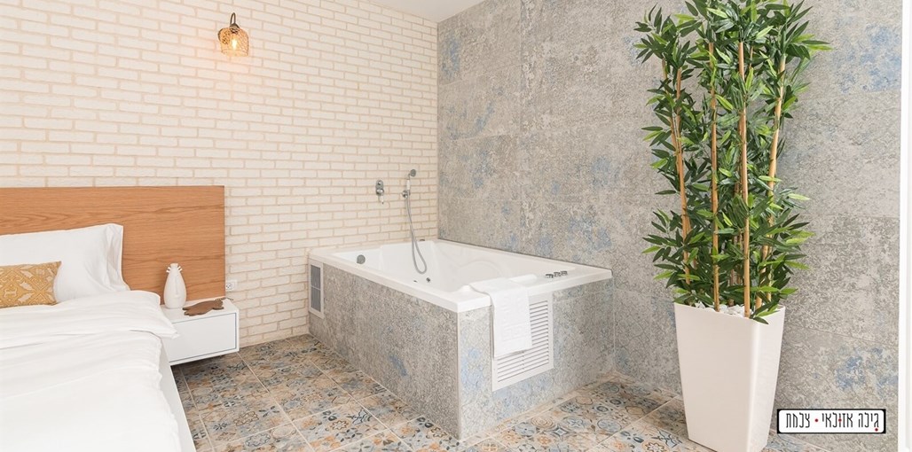 אתנחתא בגלבוע סוויטת יוון - חדר שינה (1).jpg