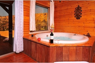 נוף לים - בקתות העץ