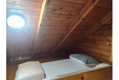 בוסתן לבל - בקתת העץ