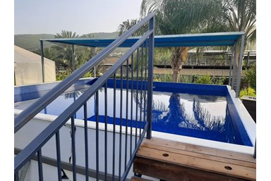 פנינת הדקל - בקתות העץ